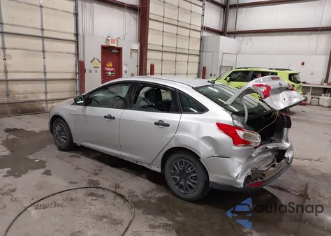 2013 Ford Focus S z USA, uszkodzony, nr VIN 1FADP3E21DL383952